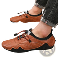 Men leather casual sneakers luxury fashion loafers in brown leather with black accents and textured rubber sole