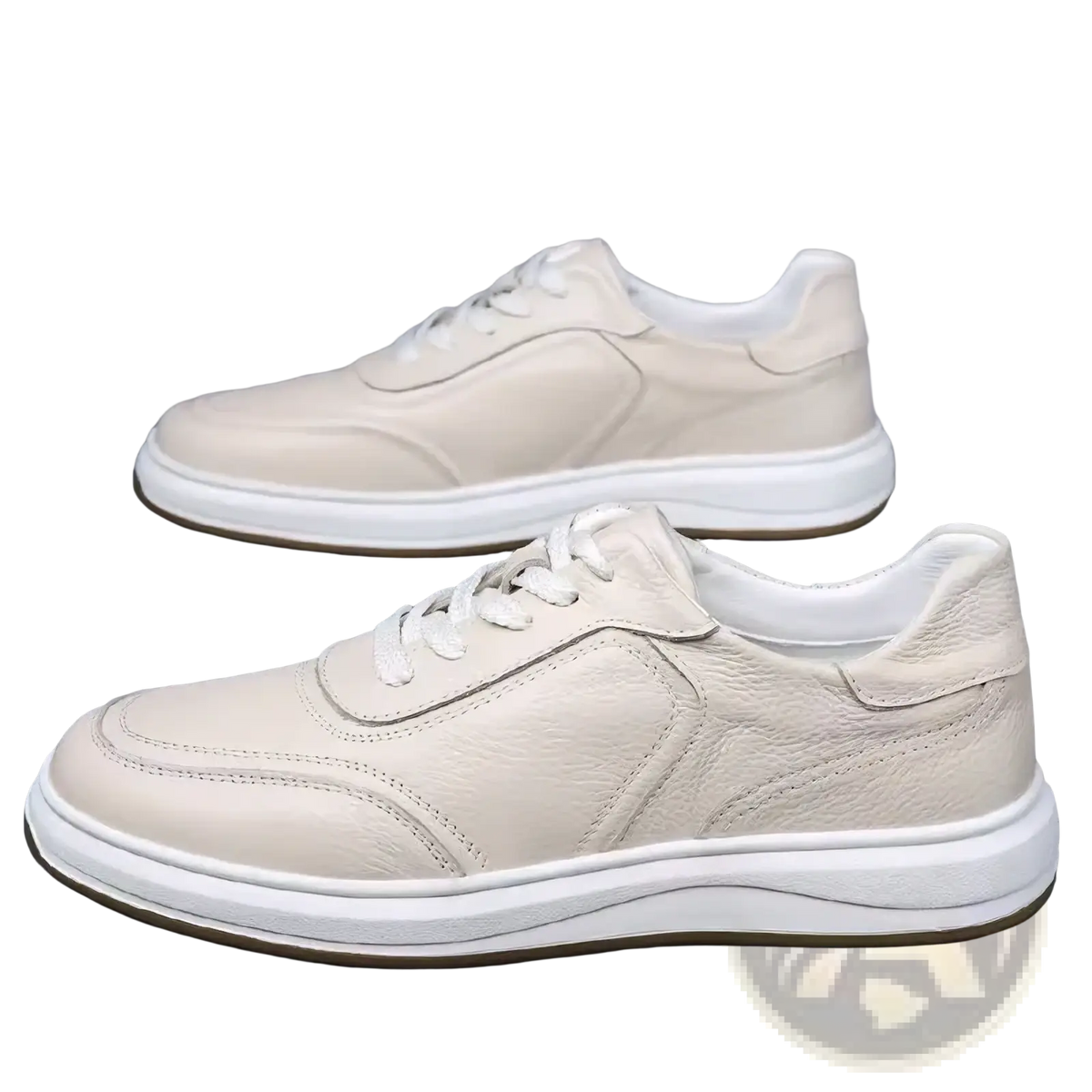 Cream-colored men leather casual slip-on sneakers with white laces and a thick cushioned sole for everyday wear