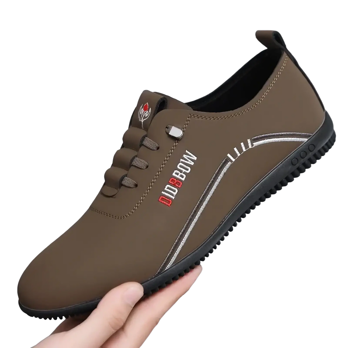 Men leather casual walking shoe in brown slip-on style with black rubber sole and red and white logo on the side