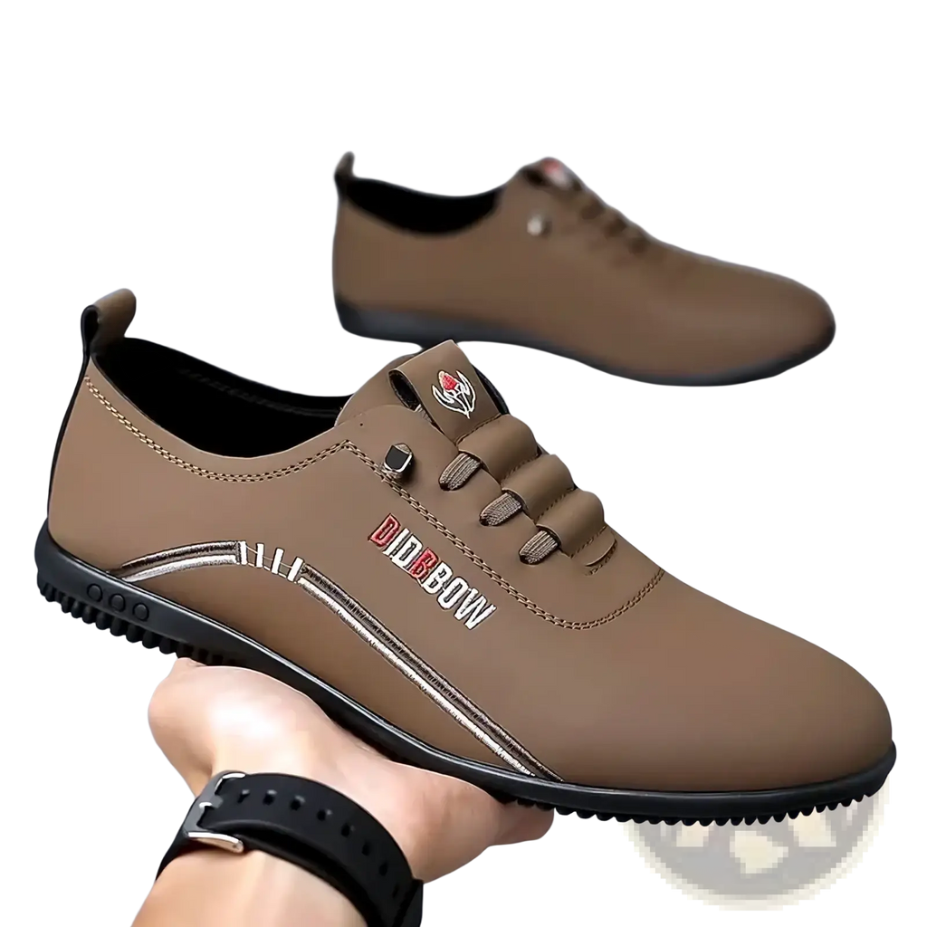 Men leather casual walking shoe in tan with soft black rubber sole and silver stitching accents