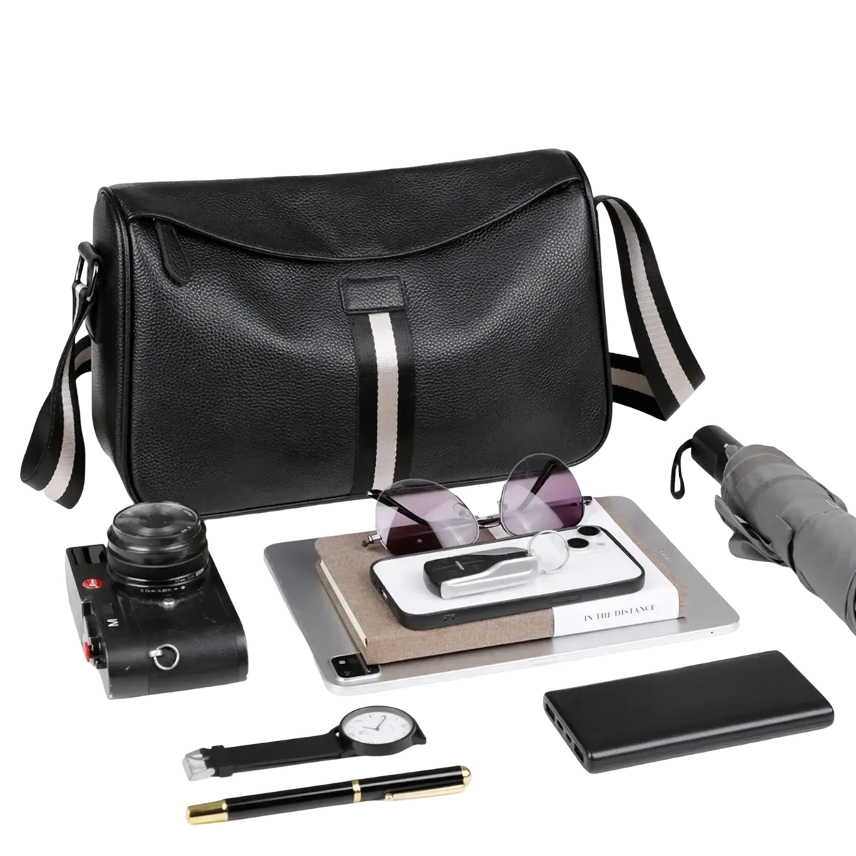 Black leather crossbody messenger bag for men with textured surface and contrasting white stripe down the front