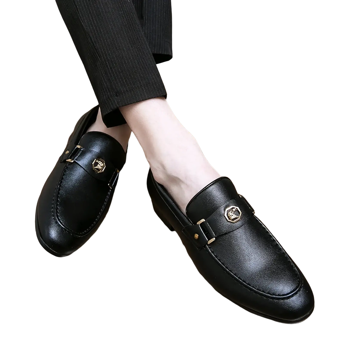 Men leather dress loafers in black with gold-toned metal buckles and subtle embossed logo on front