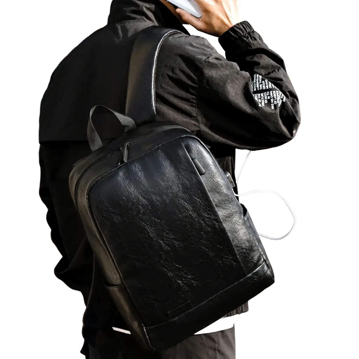 Black leather men laptop backpack with subtle texture and sleek design for business travel use
