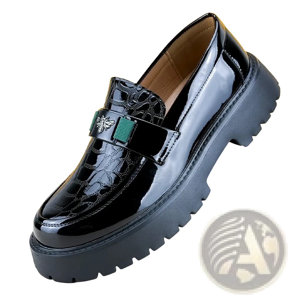 Black patent leather men loafers with glossy crocodile embossing green strap and metallic bee emblem for formal use