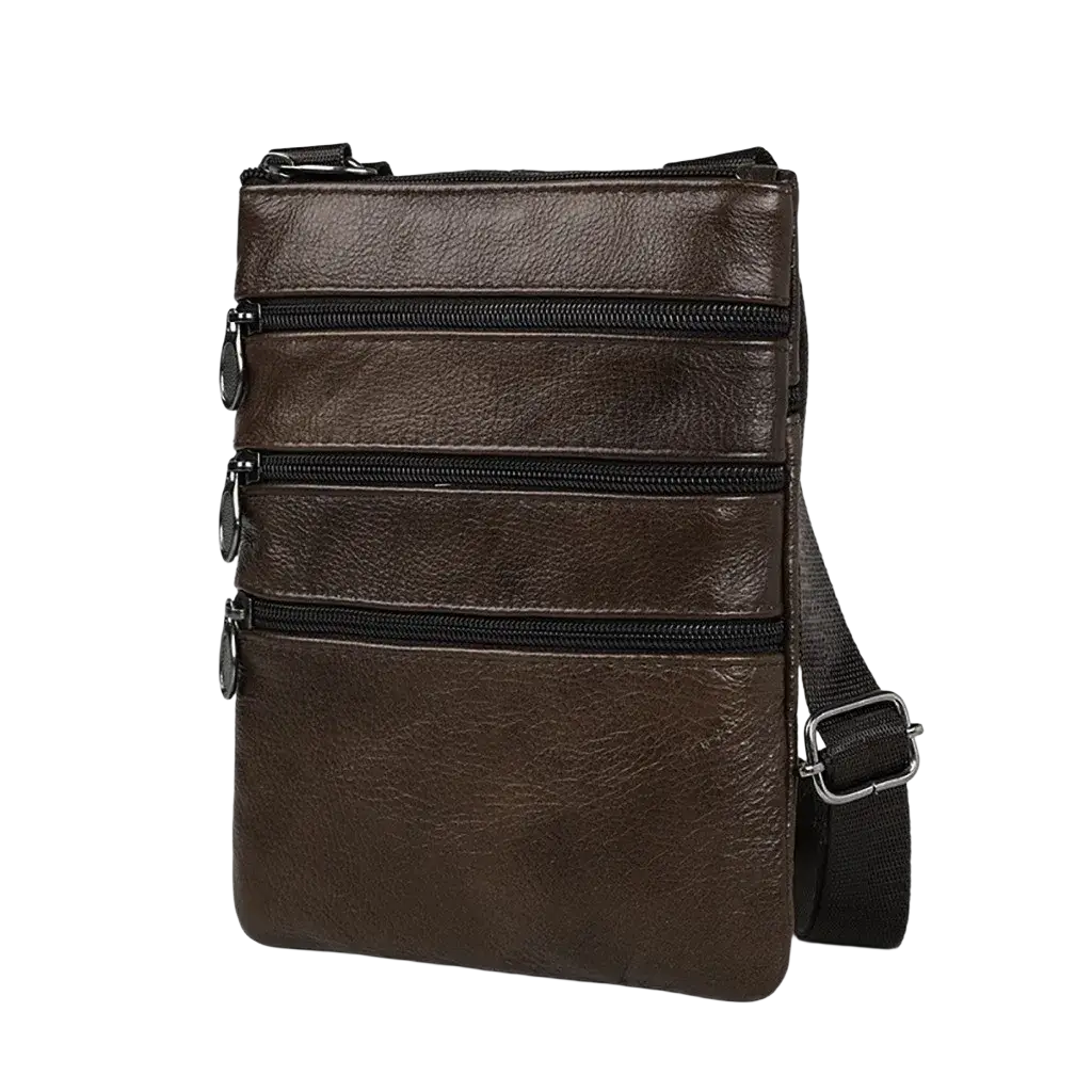 Men leather messenger bag in brown with three zippered compartments and black adjustable shoulder strap for casual use