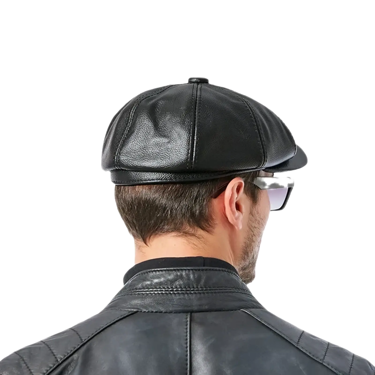 Black leather octagonal flat cap with structured six-panel design and stitched seams made of genuine cowhide