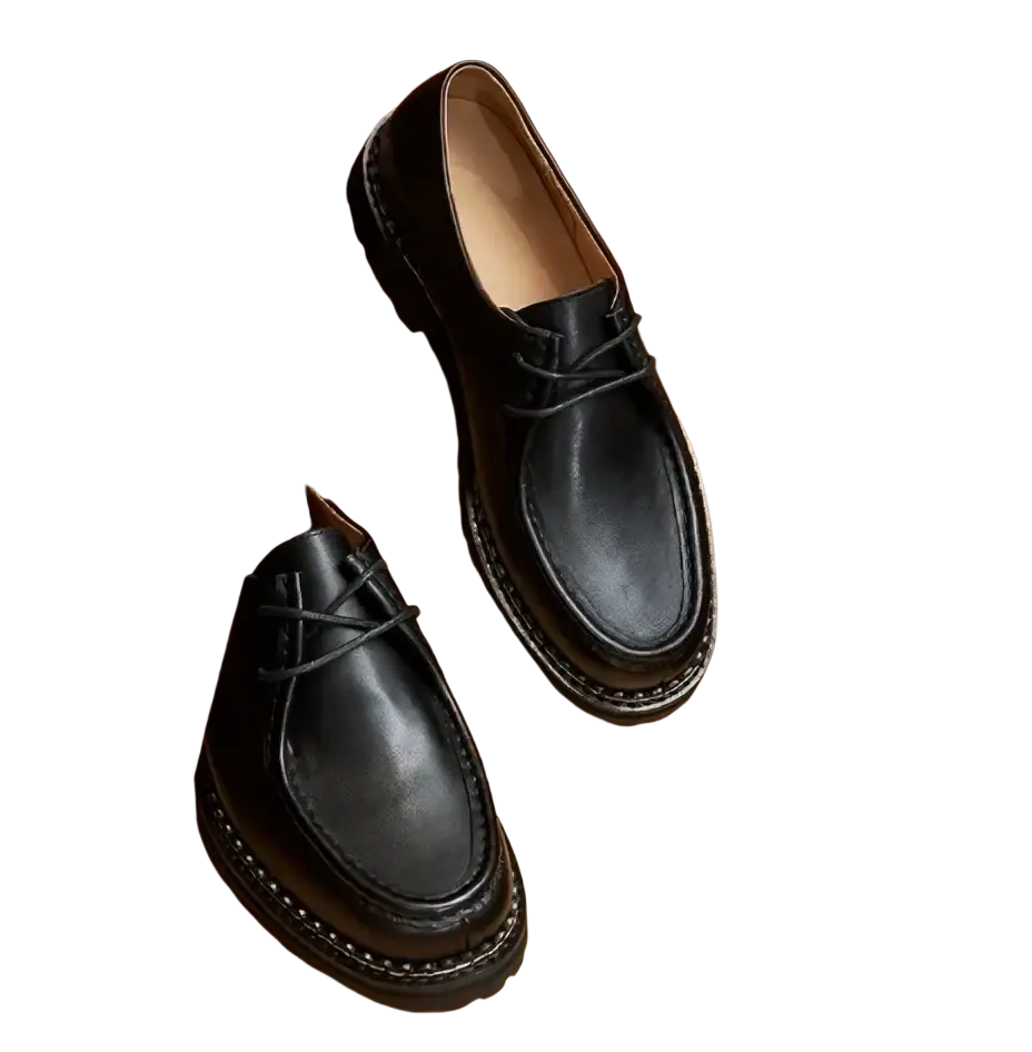 Men leather oxford dress shoes in black leather with a classic minimalist design and visible stitching along edges