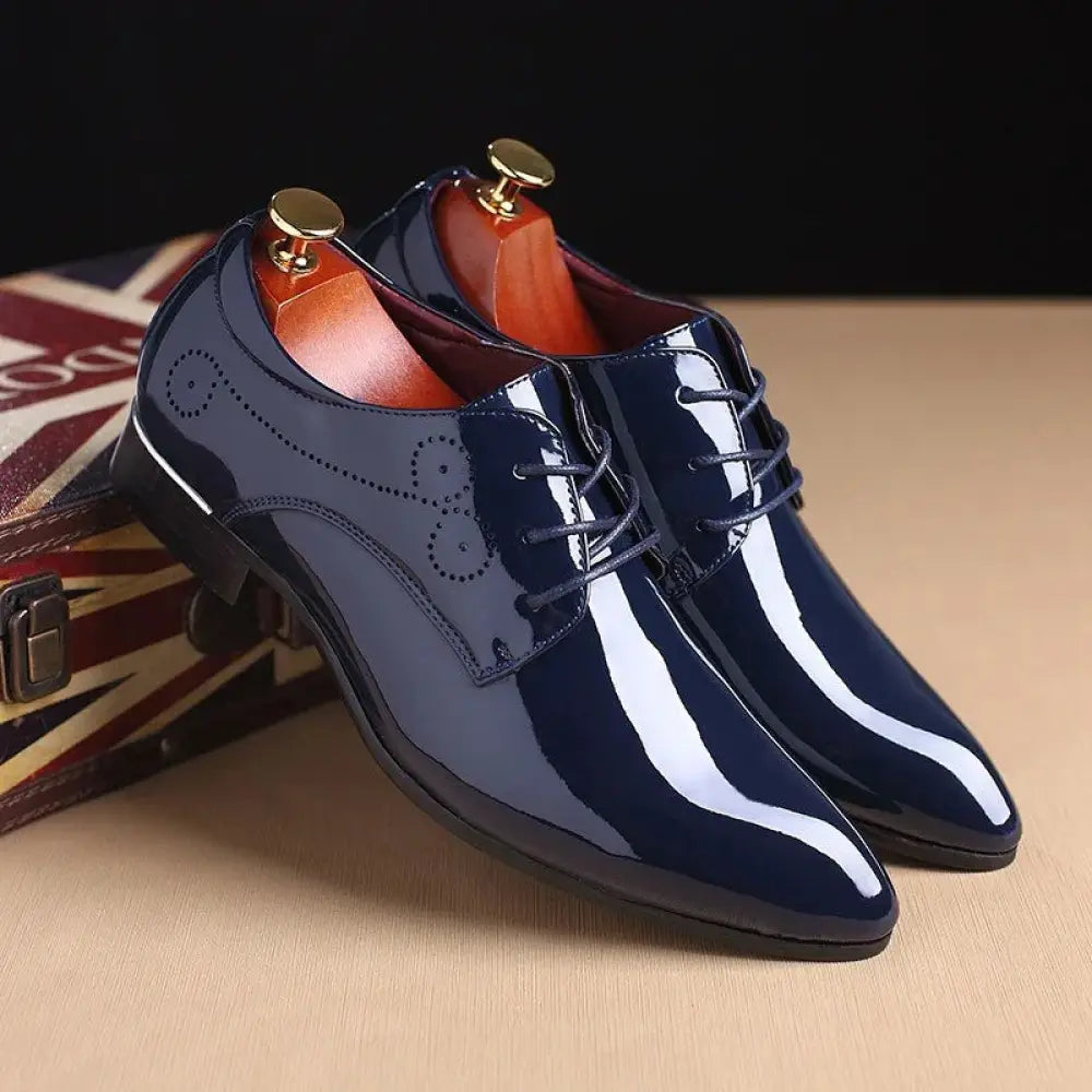 Men’s premium leather slip-on driving loafers in shiny navy blue patent leather with white stripe accents and perforated detailing