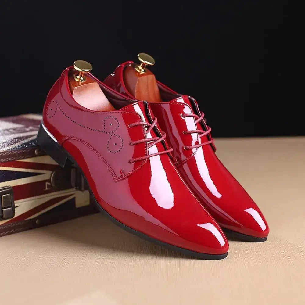 Men’s premium leather slip-on driving loafers in shiny red patent leather with gold-colored shoe trees and matching laces