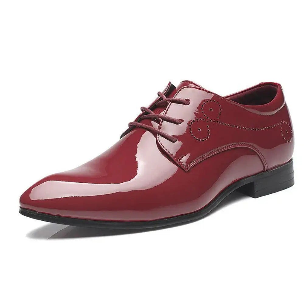Men’s premium leather slip-on driving loafers in shiny burgundy patent leather with decorative stitched swirls
