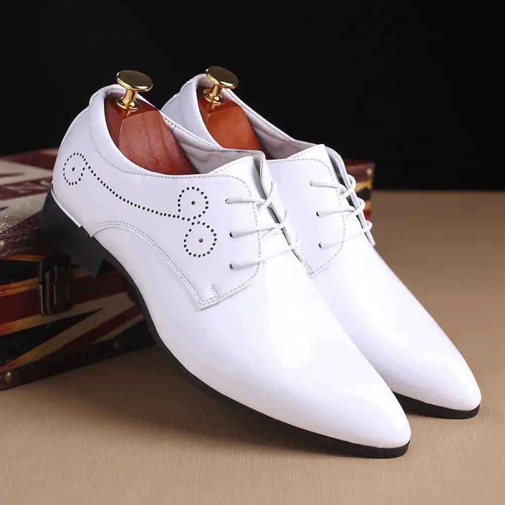 Men’s premium white leather lace-up dress shoes with perforated circular patterns on the side