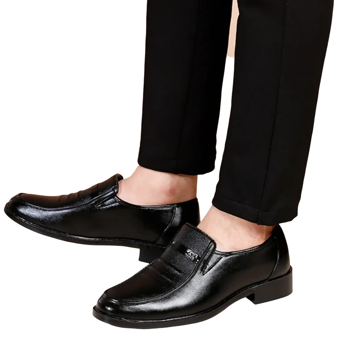 Men leather slip on dress shoes in black leather with a glossy finish and subtle stitching details