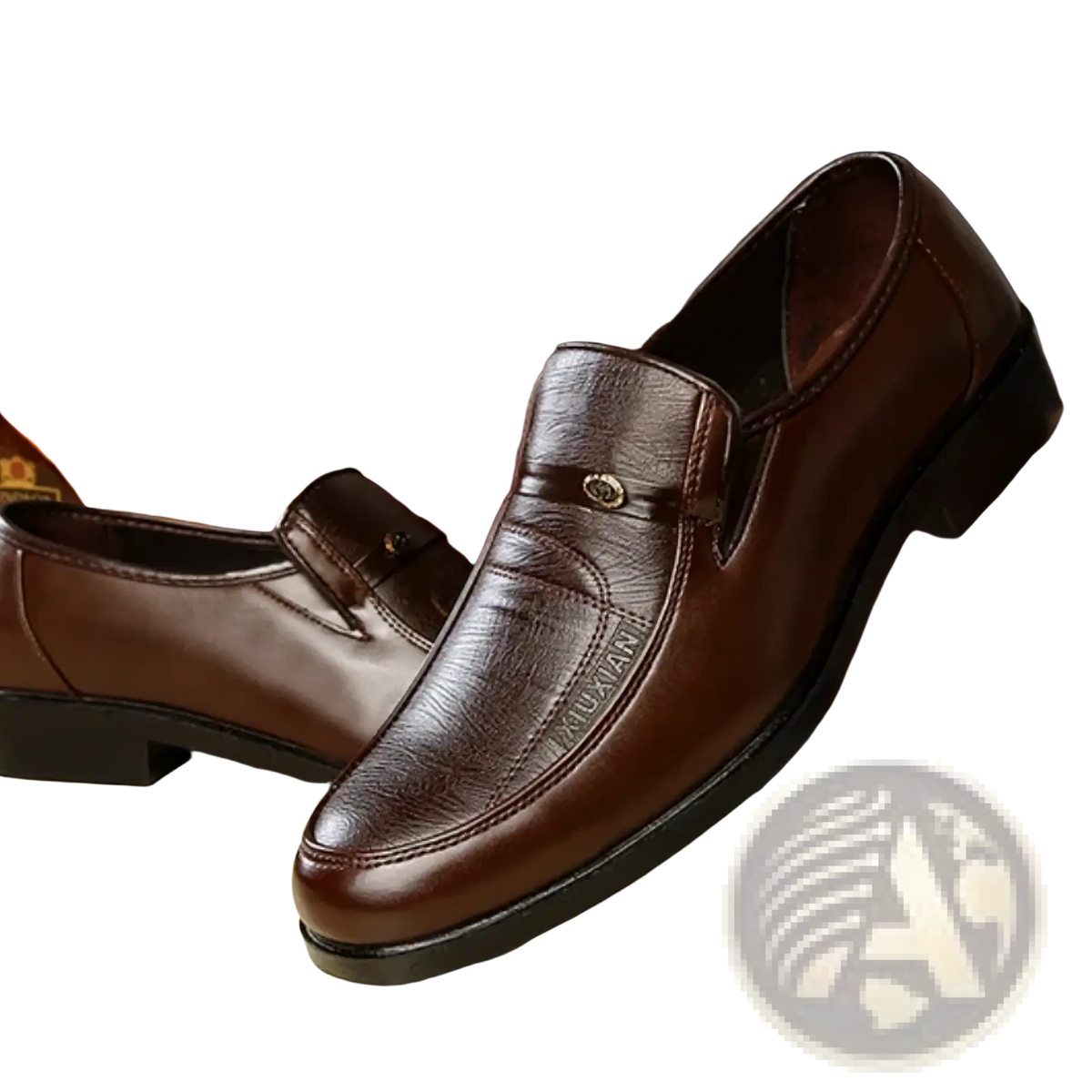 Men leather slip on dress shoes in brown with subtle textured pattern and small metallic emblem on the vamp
