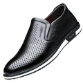 Men leather slip on driving shoe in black perforated leather with white rubber sole and fashion branding on the side
