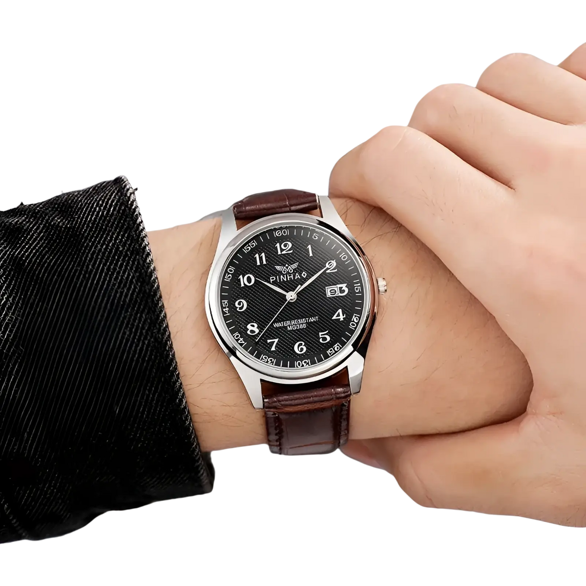 A men leather strap quartz wristwatch with a silver-toned pinhao case, black textured dial, and brown leather strap
