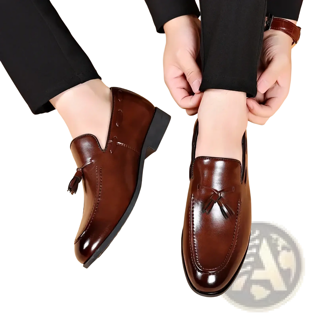 Men leather tassel loafers in brown leather with polished finish and classic design for formal use