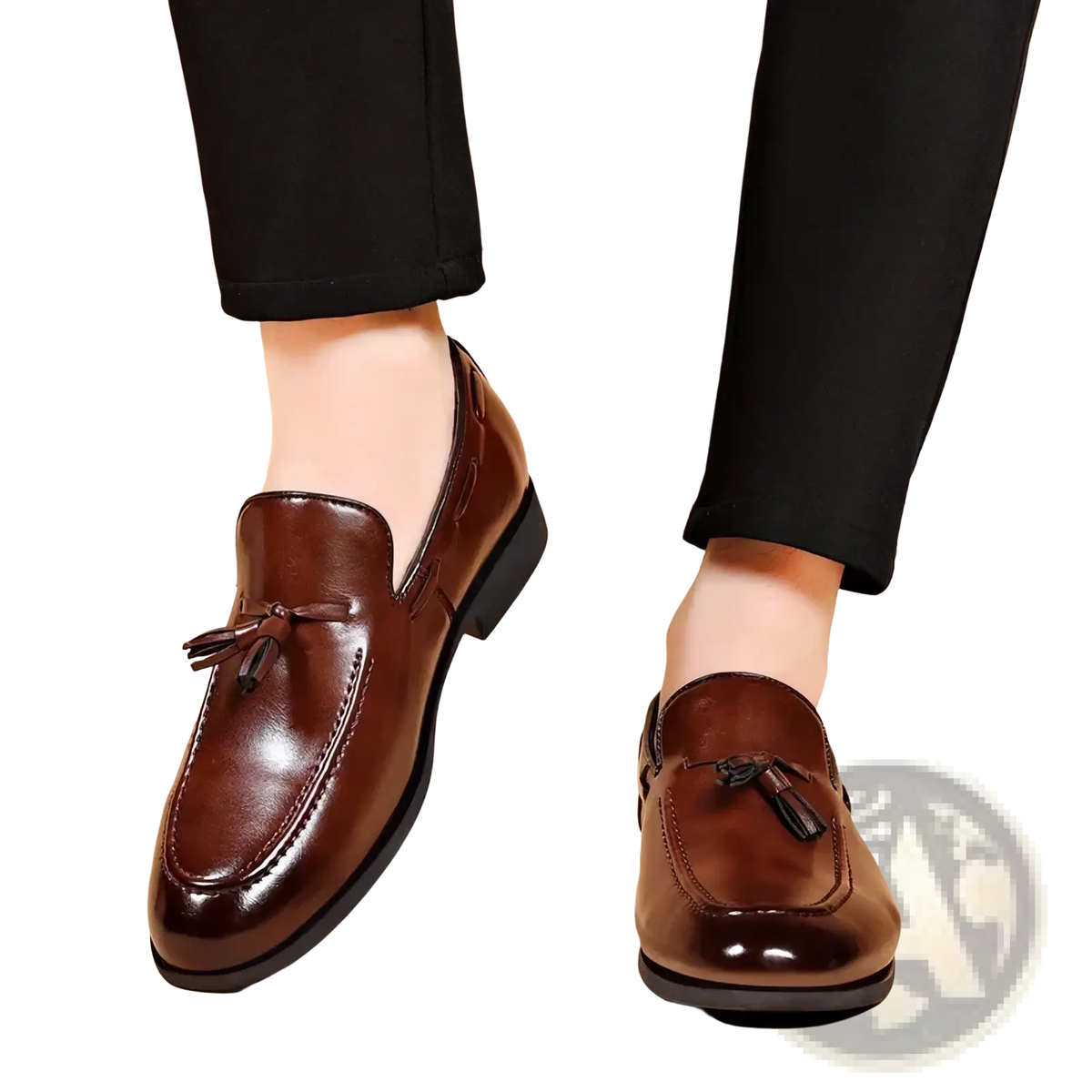 Men leather tassel loafers in brown leather with polished finish and black rubber soles for formal wear