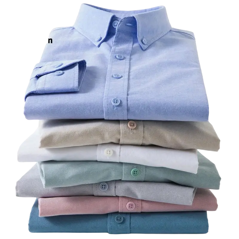 Stack of neatly folded men light blue cotton oxford button-down shirts in soft pastel shades slim fit