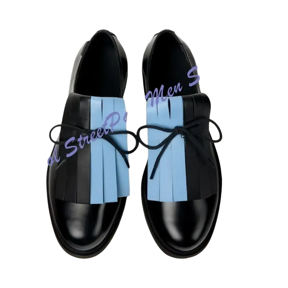 Men light blue oxford dress shoes with black leather lace up design and a fringed panel with bow tie detail