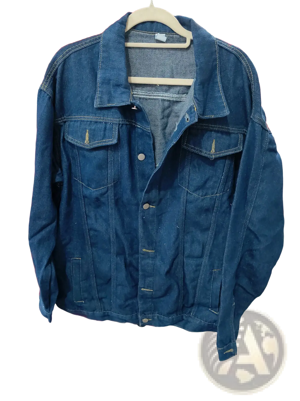 Men light wash slim fit denim jacket in classic dark blue with button-up front and two chest pockets on wooden hanger