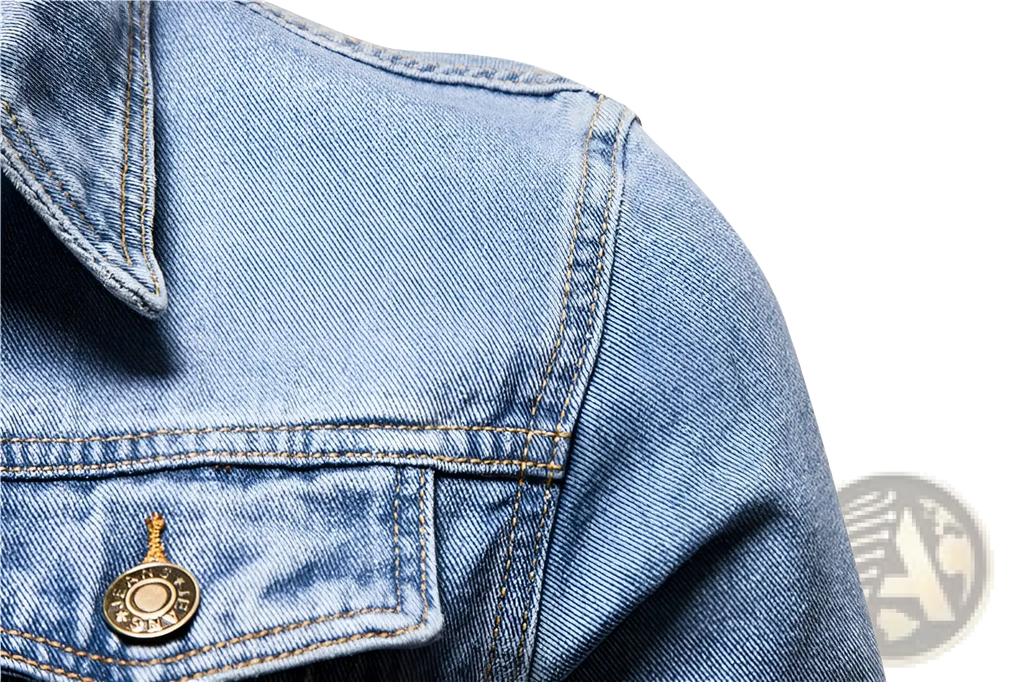 Men light wash slim fit denim jacket featuring gold toned circular buttons and contrasting stitching on light denim material