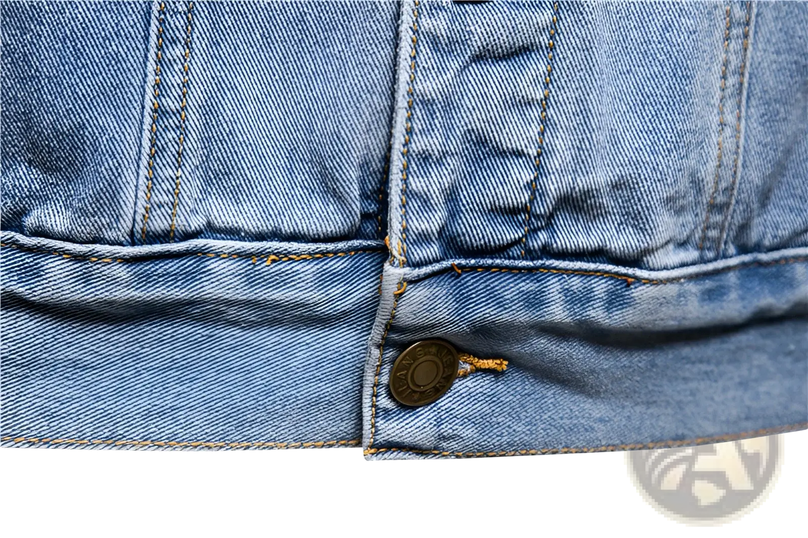 Men light wash slim fit denim jacket with vintage style brass buttons and contrasting stitching on light denim fabric
