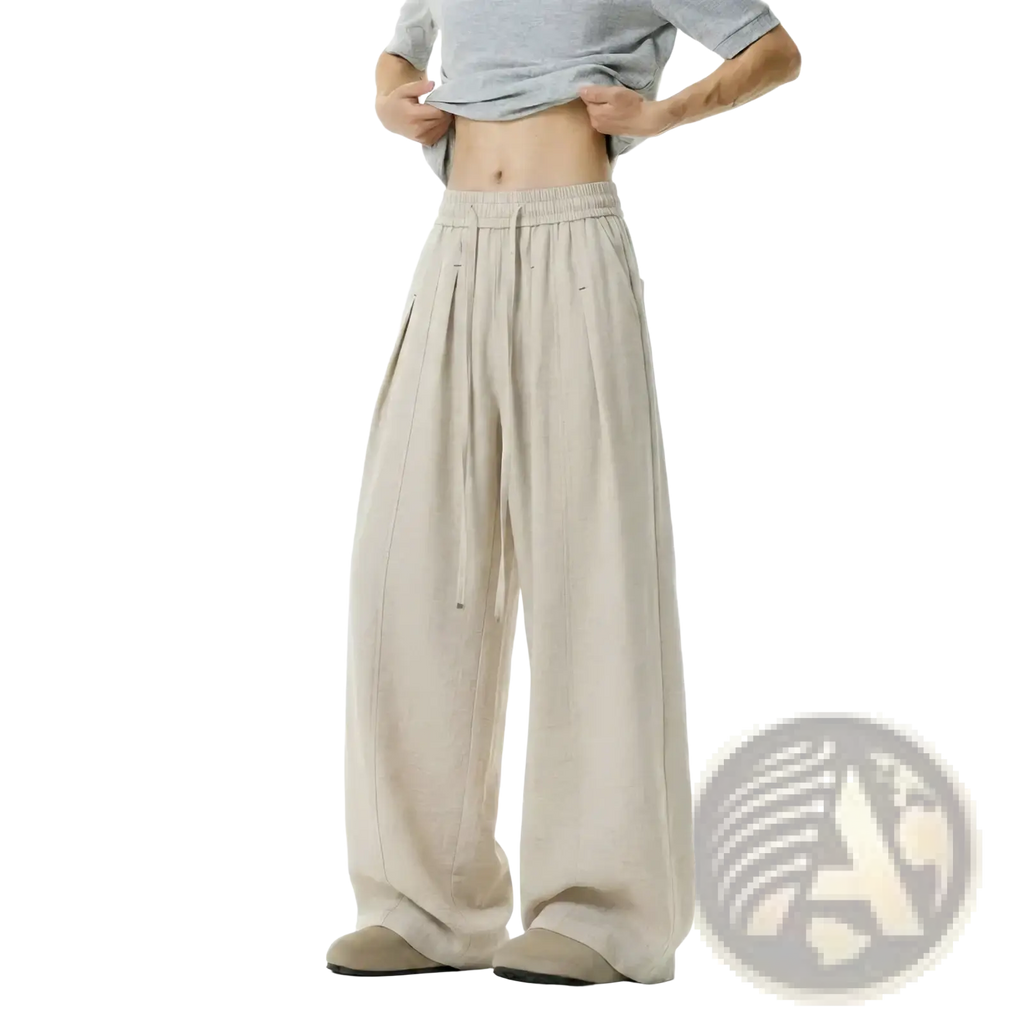 Men lightweight beige wide leg pants with elastic waistband and subtle pleats for comfortable wear
