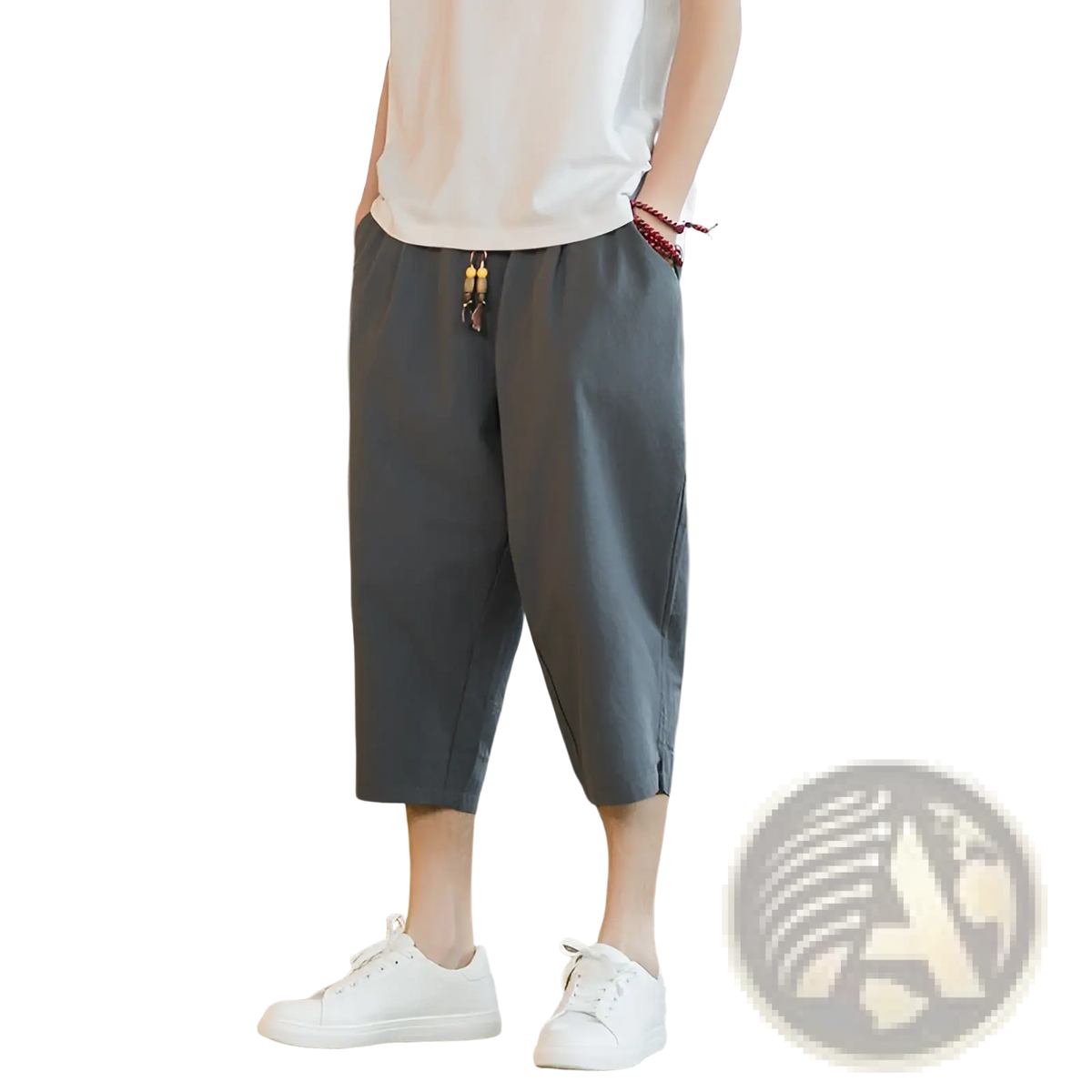 Gray loose-fitting linen capri pants for men with drawstring waist and subtle side pockets in relaxed fit