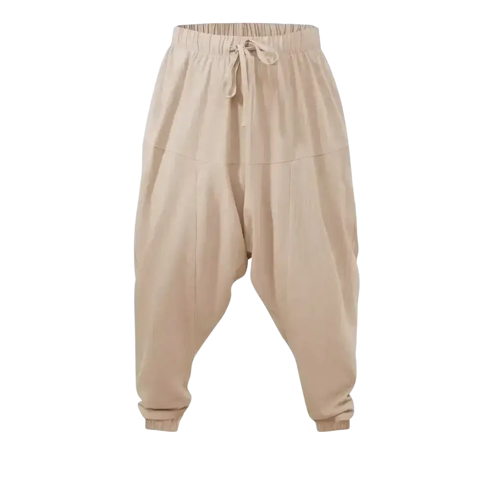 Beige linen harem pants with elastic waistband and drawstring featuring a loose fit for men linen harem joggers
