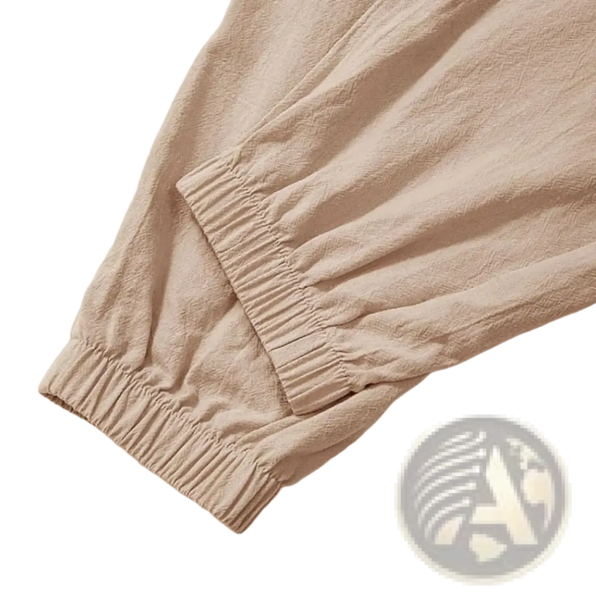 Beige men linen harem pants with loose fit and elastic cuffs made of breathable linen fabric