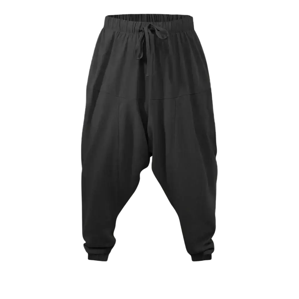 Men linen harem pants in black with loose fit elastic waistband and drawstring for comfortable casual wear