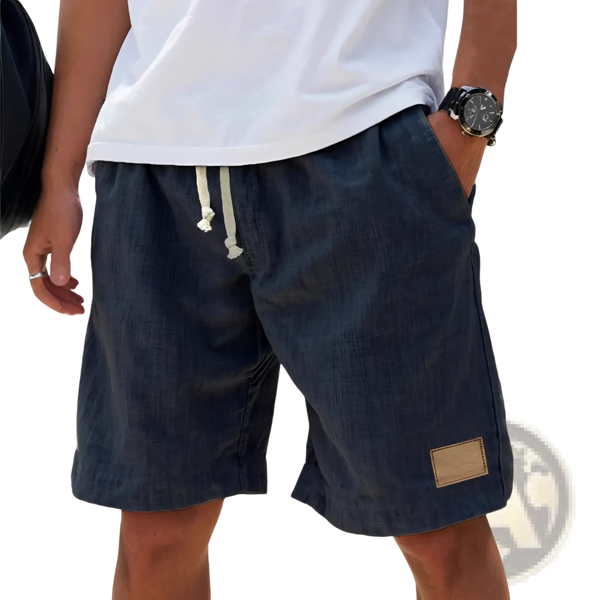 Men linen holiday shorts in dark blue linen with a white drawstring and tan leather patch for breathable loose fit comfort