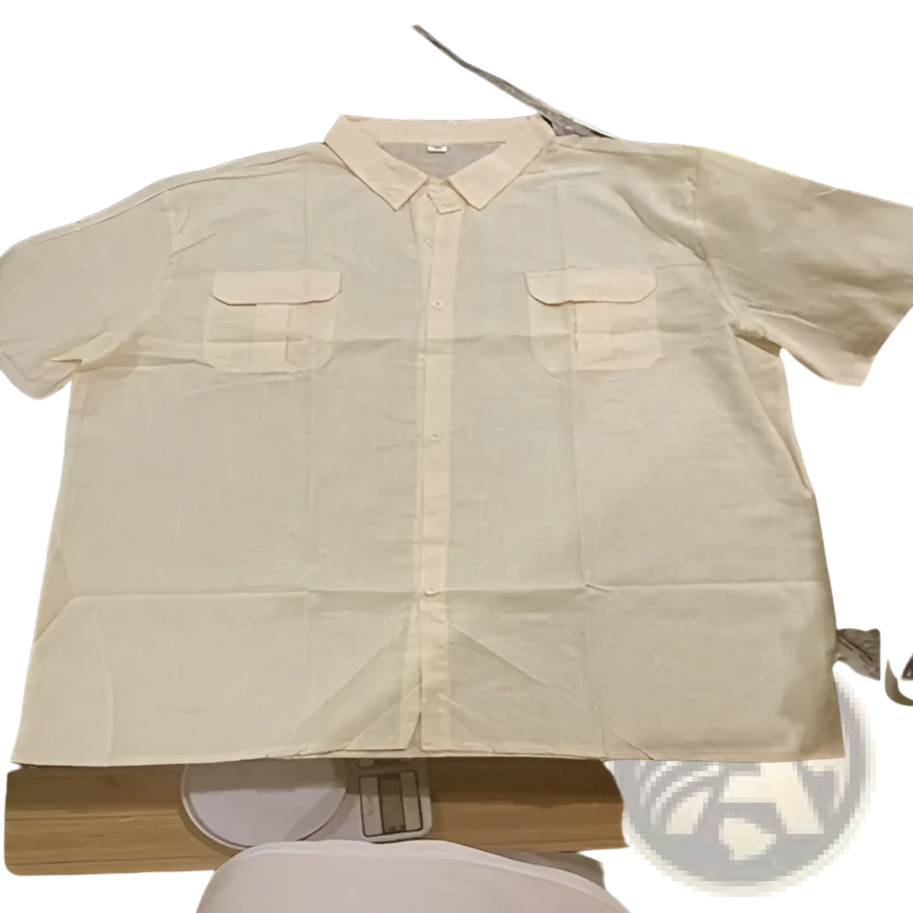 A beige linen men short sleeve button up shirt with double chest pockets and a classic collar for casual summer wear
