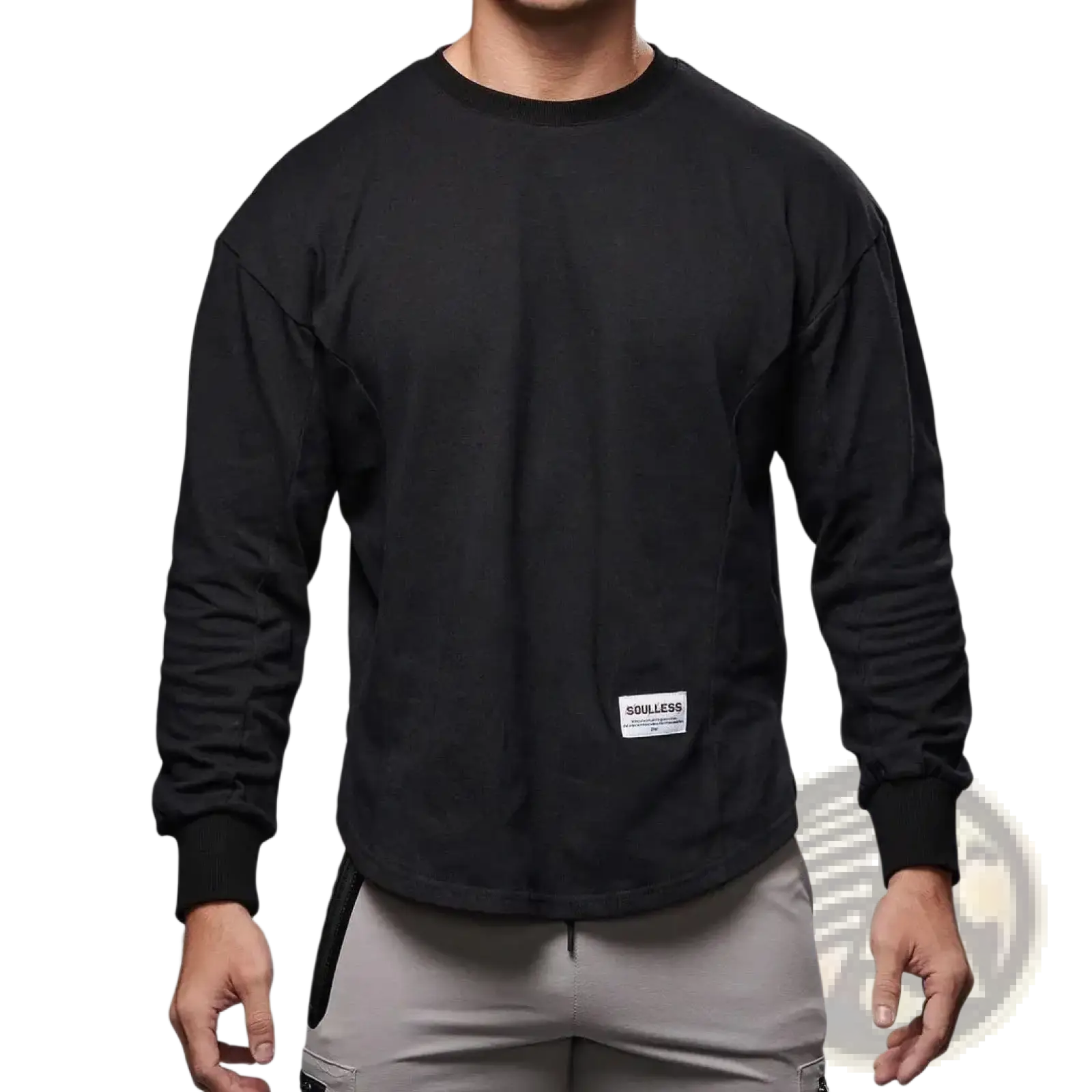 Men long sleeve cotton t shirt in black with curved hem and white rectangular label on the lower front