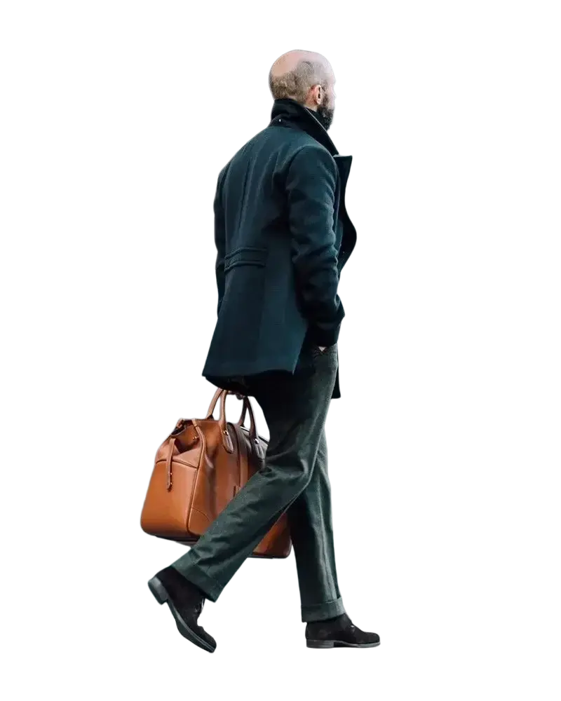 Brown leather briefcase with top handles and rectangular design paired with men long wool peacoat double breasted jacket