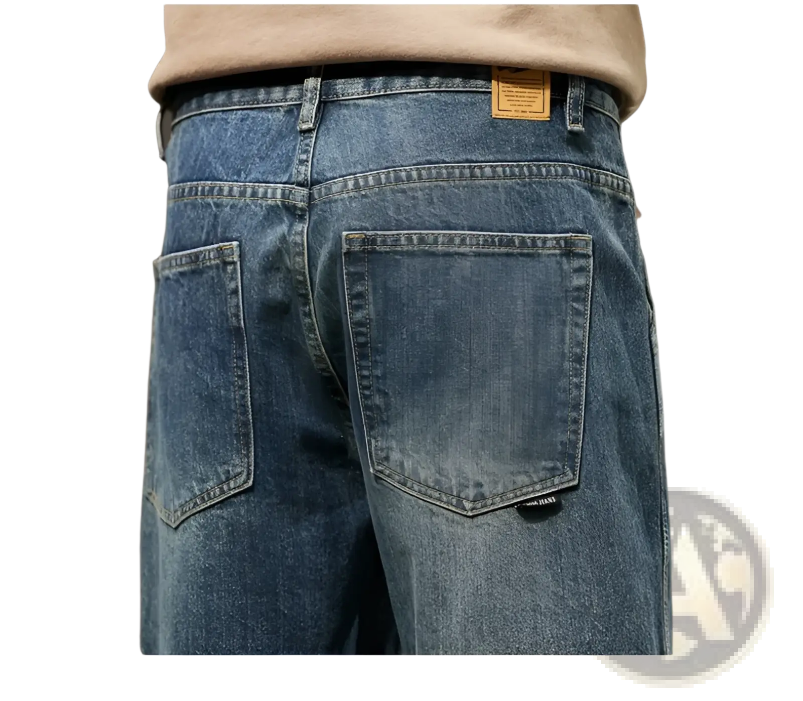 Back view of men loose denim harem jeans in blue faded wash with classic back pockets made of denim material
