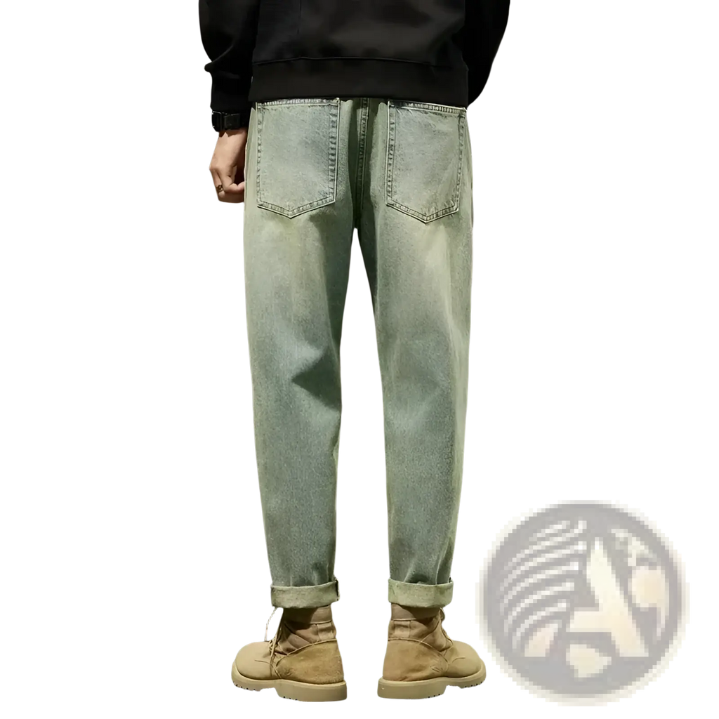 Men loose denim harem jeans in light-wash denim with a relaxed fit and rolled cuffs for casual wear
