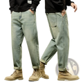 Men loose denim harem jeans in light-wash denim with a relaxed tapered fit and rolled cuffs