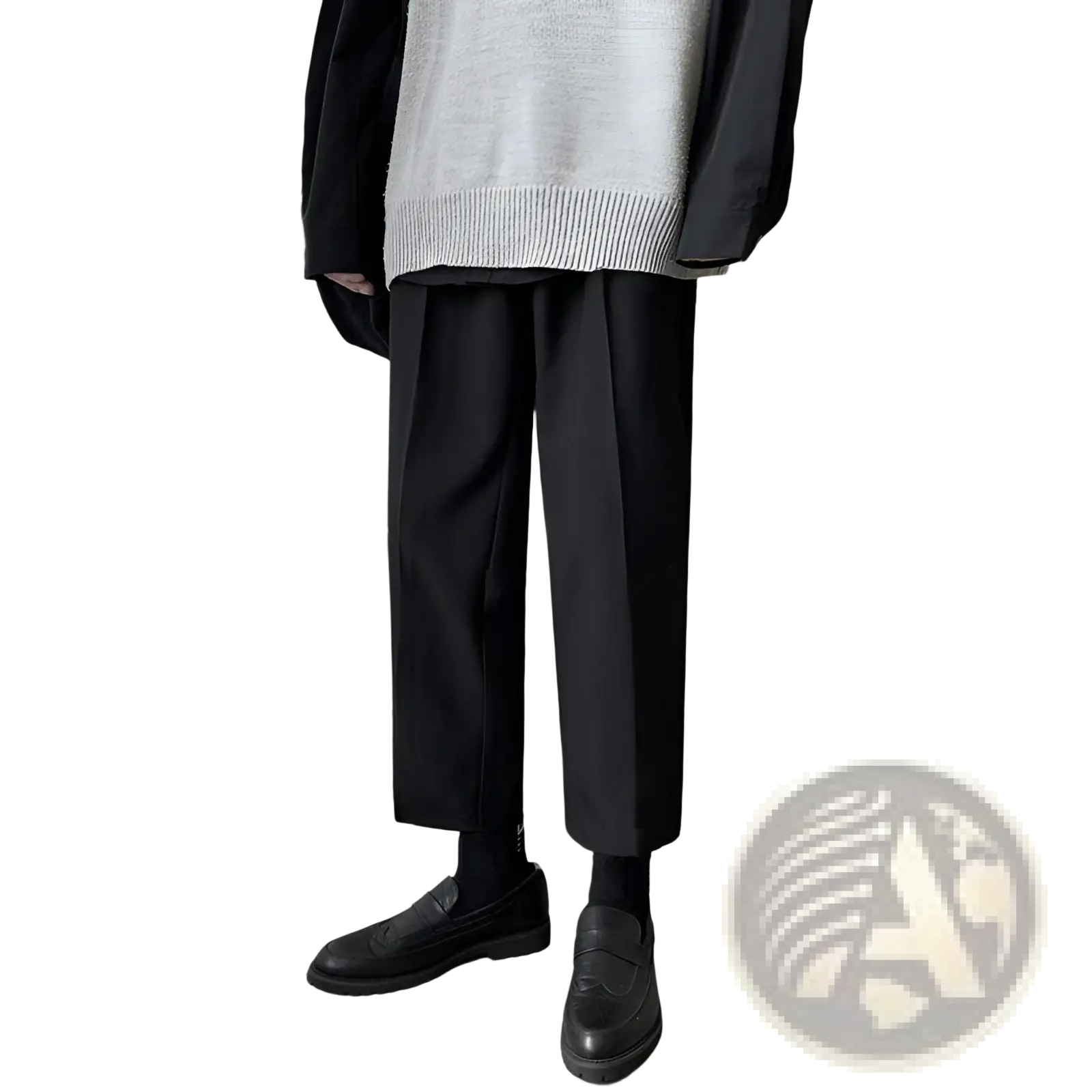 Black leather loafers with classic slip-on design and subtle stitching paired with men loose fit straight leg suit pants