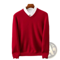 Men merino cashmere v neck sweater in red knit displayed with white collared shirt on wooden hanger