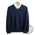 Navy blue men merino wool v-neck sweater with white collared shirt underneath made of soft knit material
