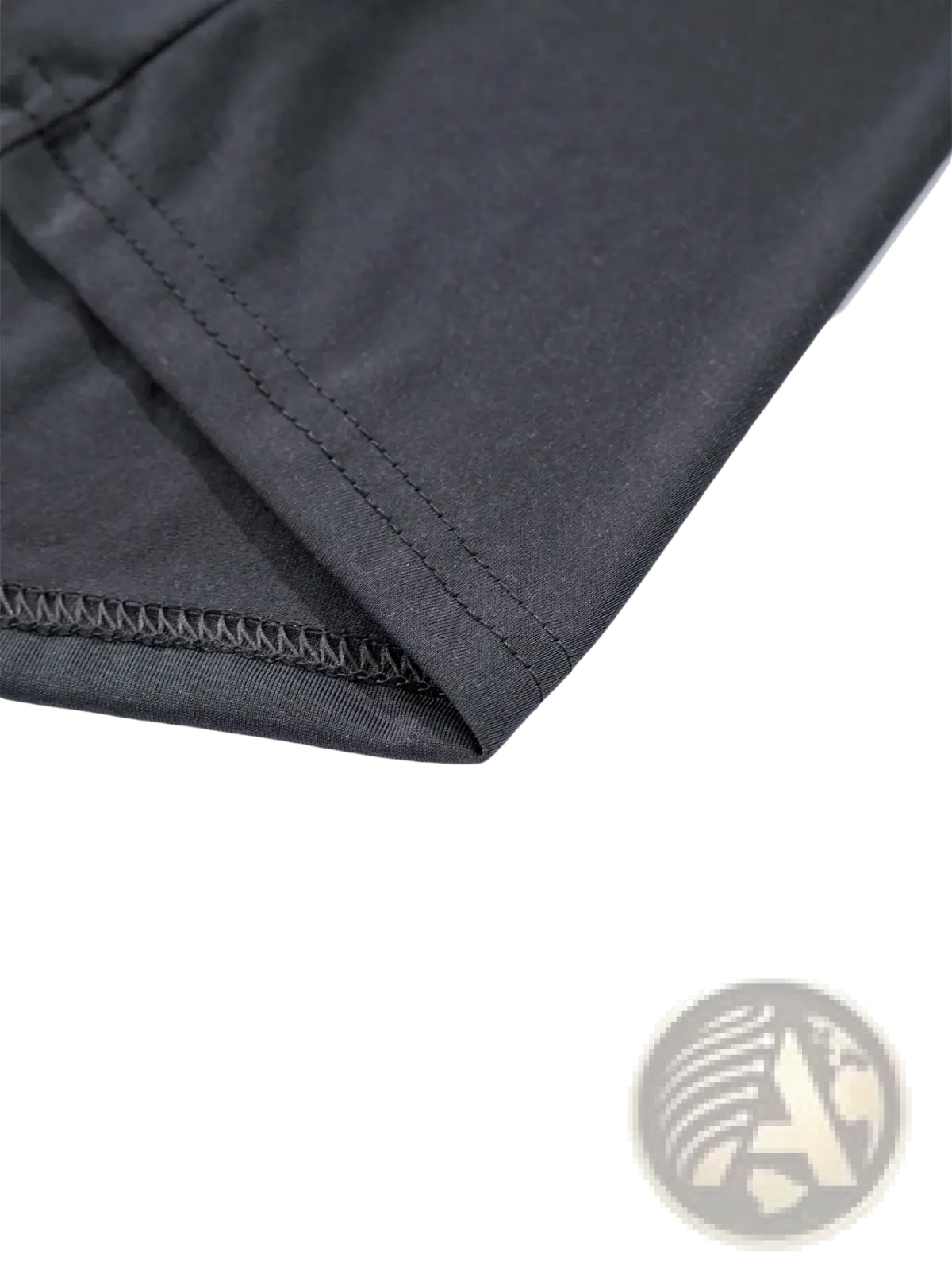 Black moisture wicking long sleeve crew neck t shirt fabric with neat matching stitching along the hem