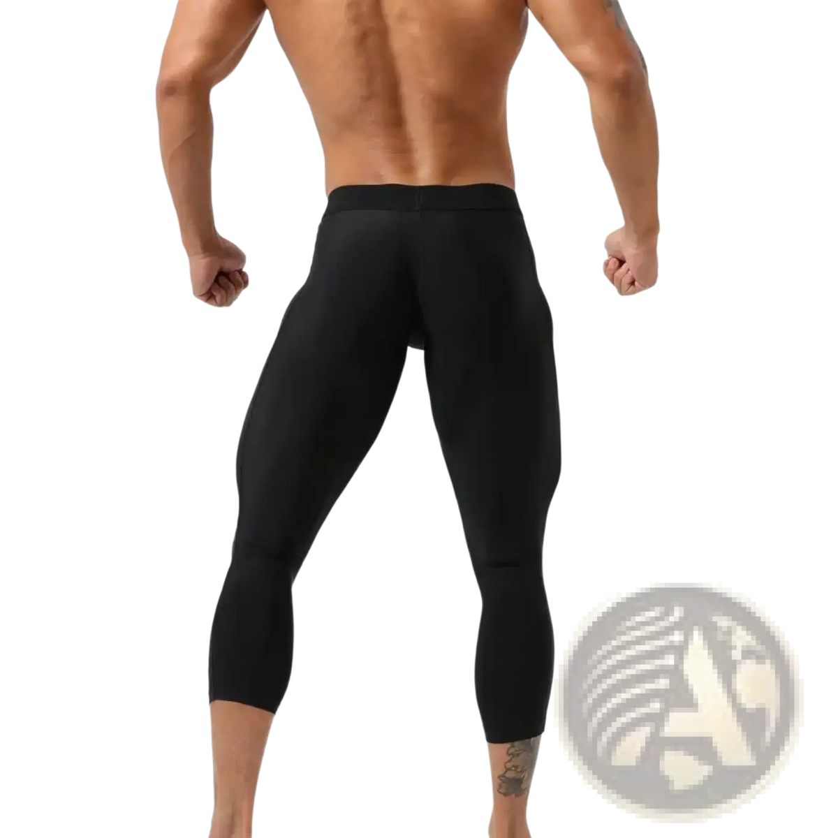 Black nylon men fitness tights workout pants with form-fitting compression, snug waistband, and seamless design