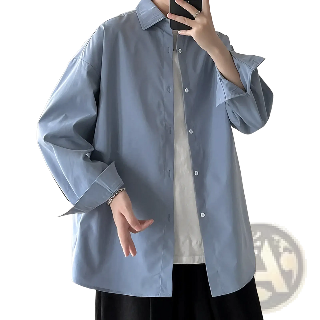 Men oversized long sleeve casual streetwear shirt in light blue featuring a classic collar and button-up front