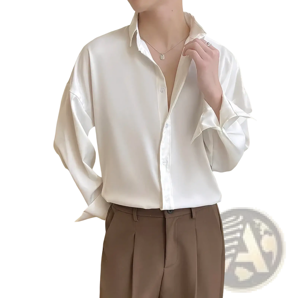A men oversized white ice silk dress shirt with a sleek satin finish relaxed fit and rolled cuffs