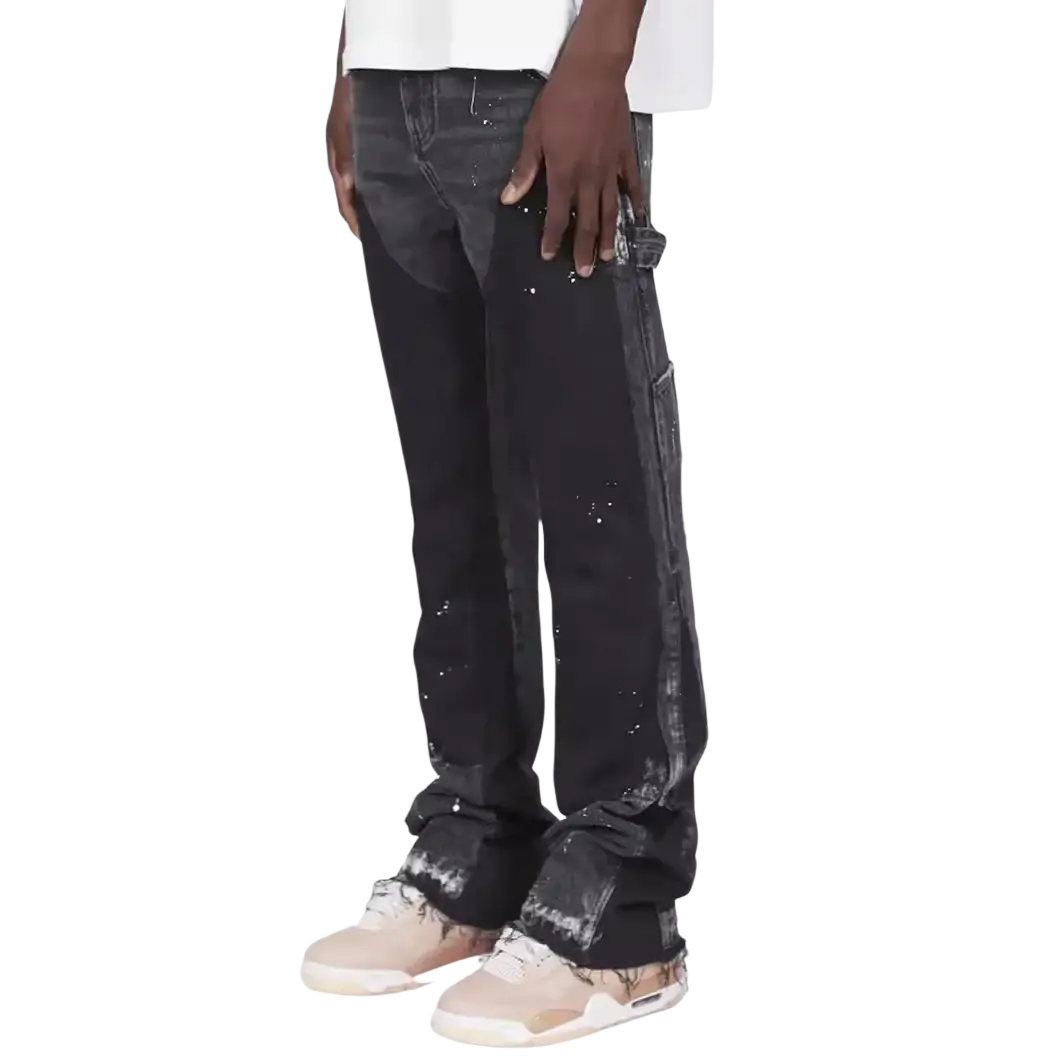 Men paint splatter distressed straight jeans black denim with paint splatter details and rolled cuff design front view