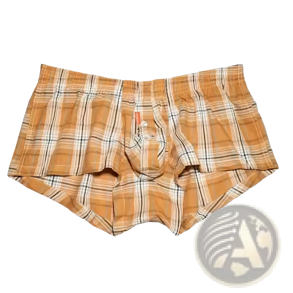 A pair of seobean men’s plaid boxer briefs in tan and white with black stripes and an elastic waistband