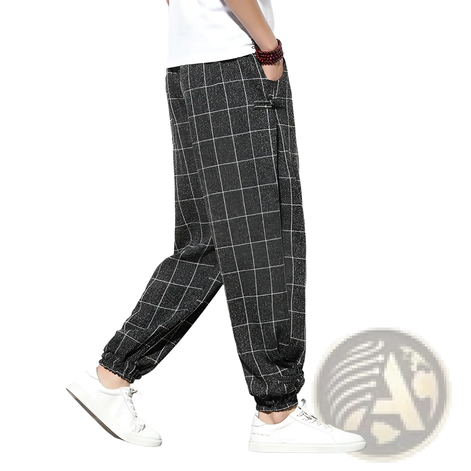 Men plaid harem pants in black and white checkered cotton with elastic cuffs for a loose casual fit