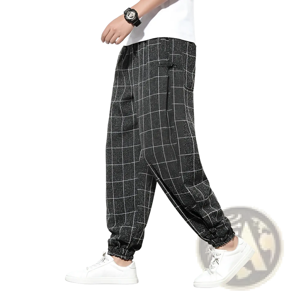 Men plaid harem pants with a black and white checkered pattern and loose casual cropped fit