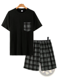 Men plaid pajama set with black short-sleeved top featuring gray and black plaid pocket paired with matching shorts